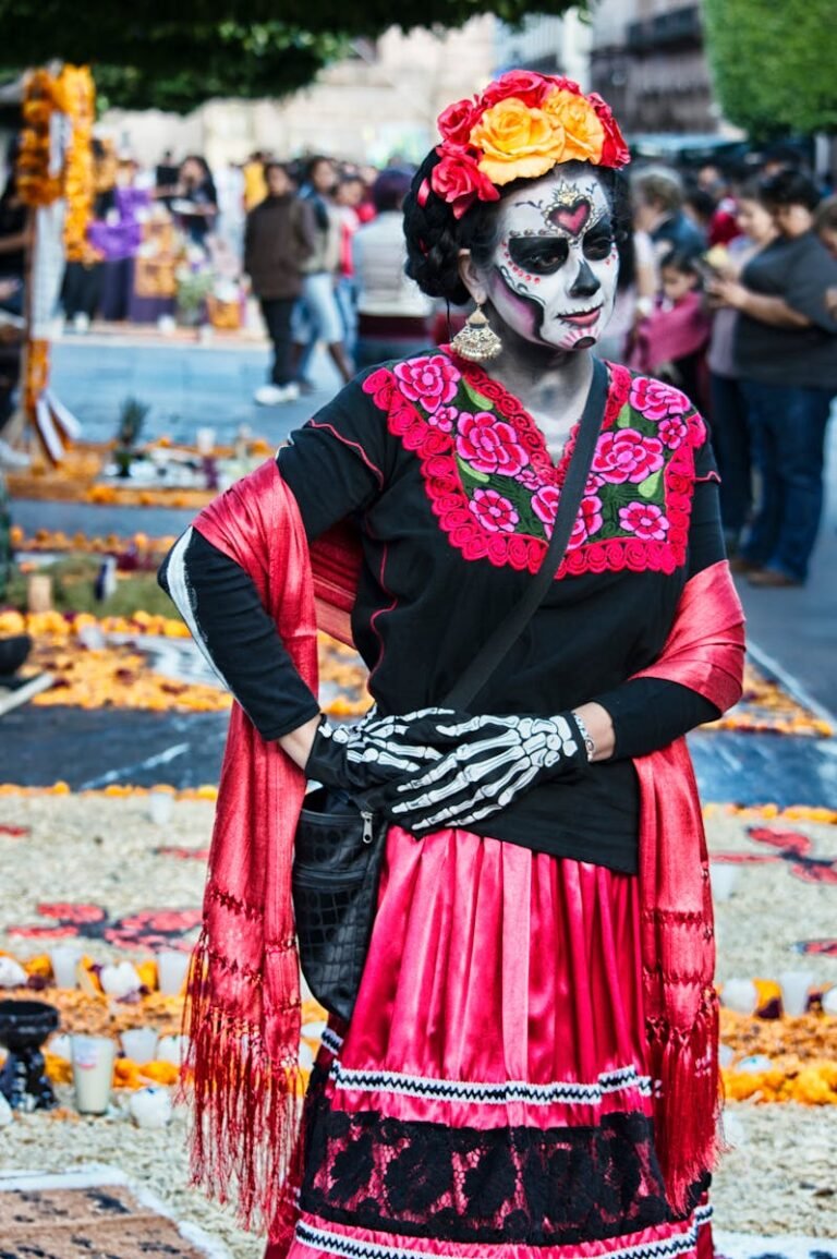 Retire in Mexico Woman in traditional Day of the Dead costume and face paint at a festive parade in Mexico City.